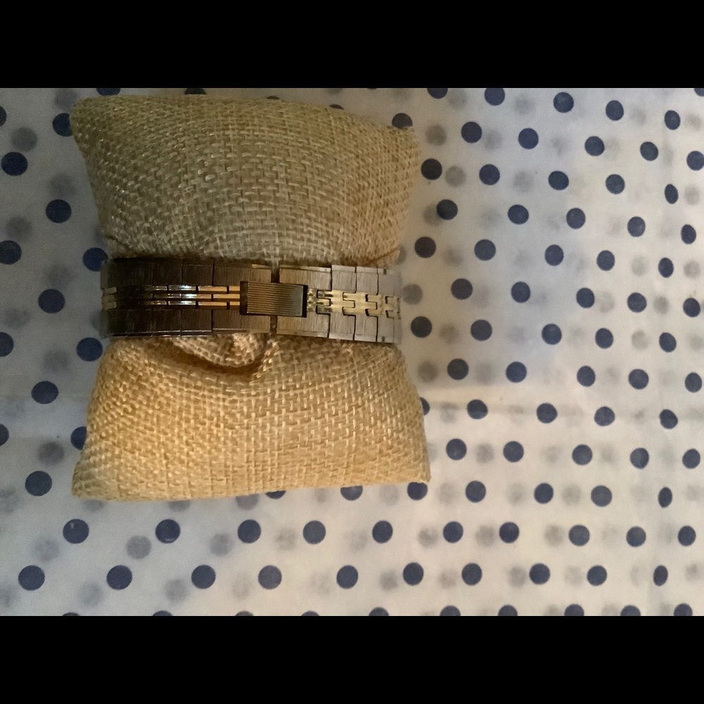 Gold tone band watch
